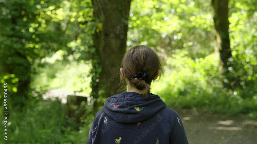 Female Taking Mental Health Walk in Natural Woodland to Relieve Stress and Find Inner Peace Female Taking Mental Health Walk in Natural Woodland to Relieve Stress and Find Inner Peace