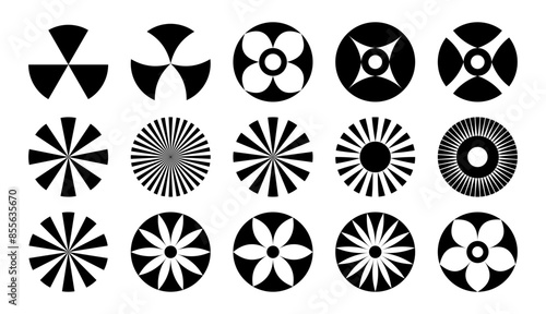 The circular shape is a dark silhouette with a pattern.