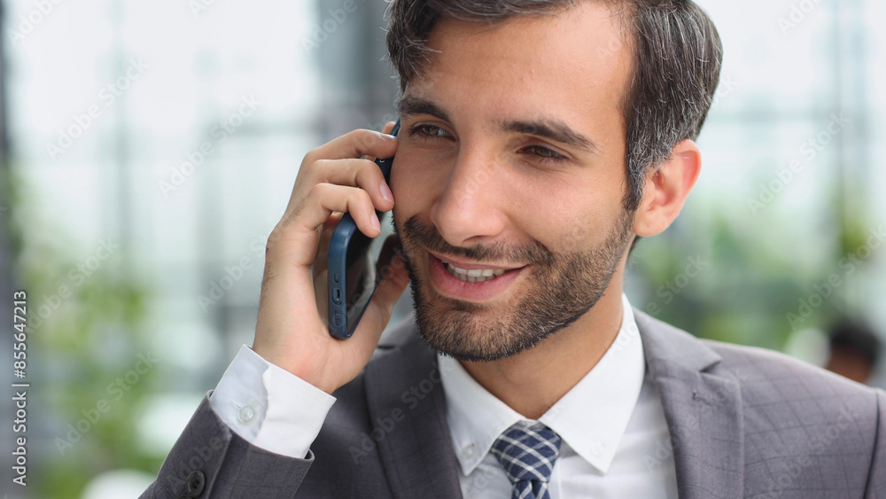 Close up cropped side profile portrait of a successful young man, having a business conversation Close up cropped side profile portrait of a successful young man, having a business conversation