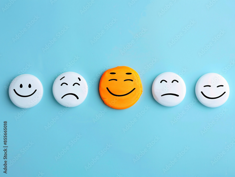 a group of white round buttons with a smiley face in the middle a group of white round buttons with a smiley face in the middle