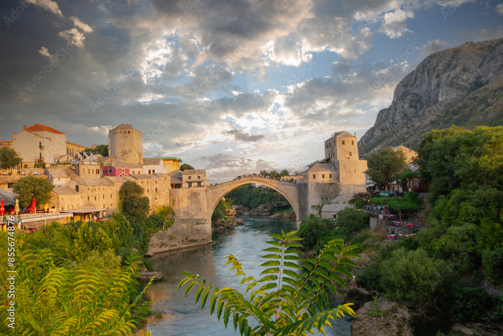Stari Most bridge at twilight in old town of Mostar, Bosnia and Herzegovina. Mostar cityscape at summer Stari Most bridge at twilight in old town of Mostar, Bosnia and Herzegovina. Mostar cityscape at summer