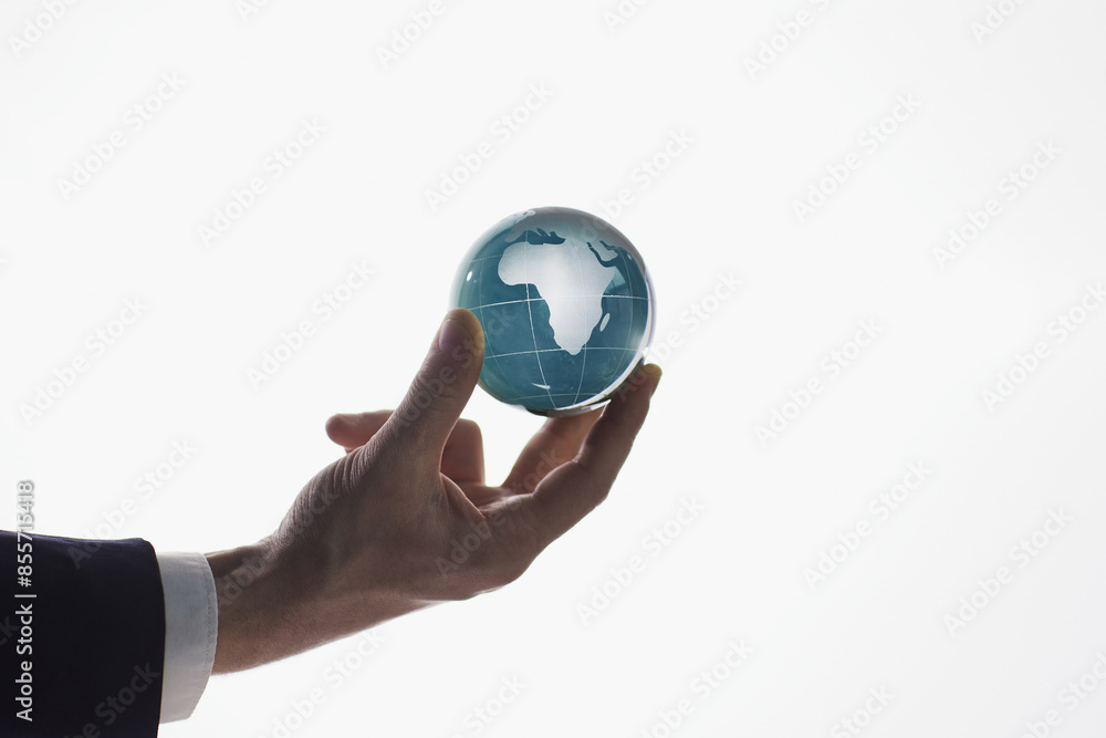 businessman holding a globe, earth, planet with a map. Isolated on white background. businessman holding a globe, earth, planet with a map. Isolated on white background.
