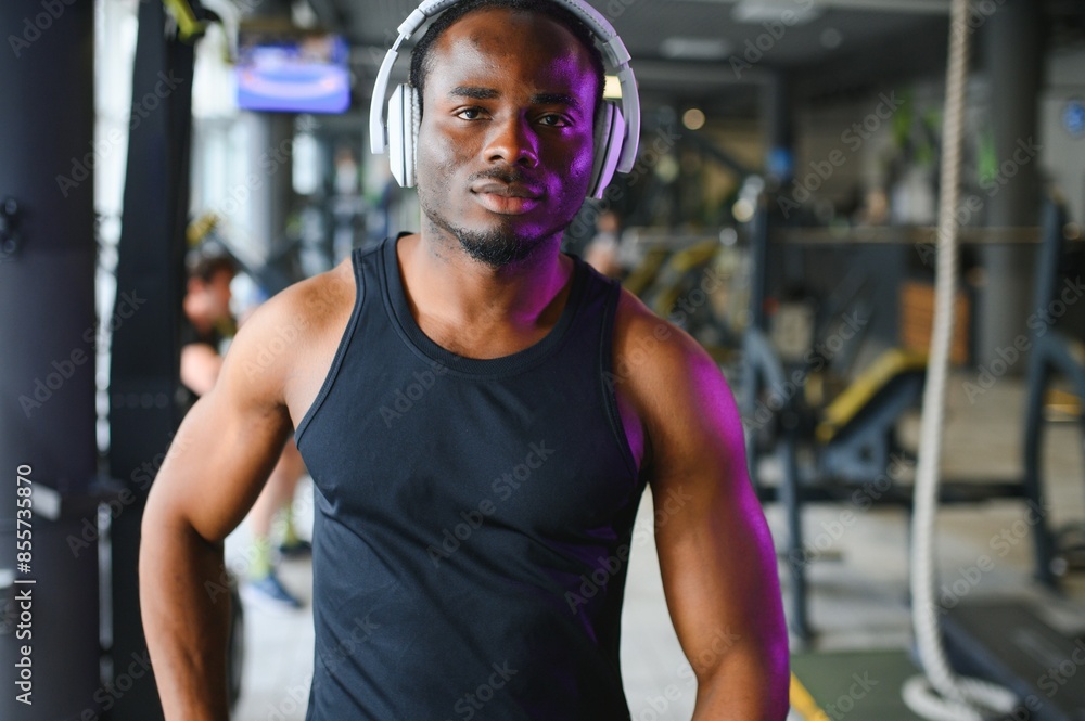 African american man standing on gym background African american man standing on gym background