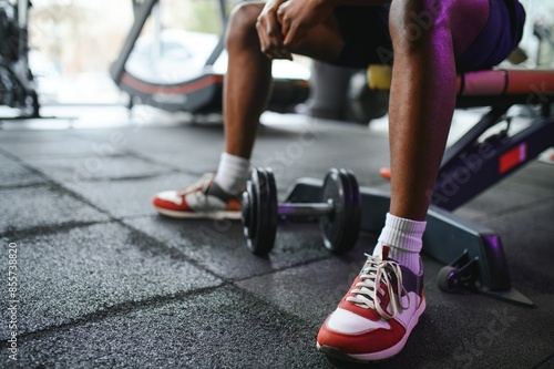 African American man working out in the gym. © Serhii