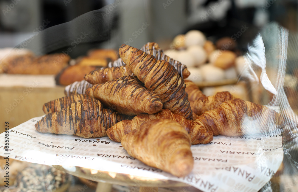 freshly made puff pastry, butter and chocolate croissants freshly made puff pastry, butter and chocolate croissants