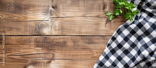 Checkered towel on wooden t...