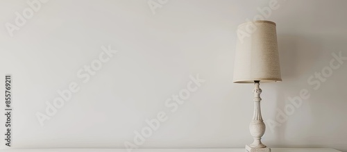 cream colored table lamp an...