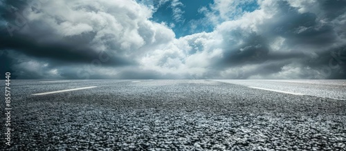 Asphalt road and sky dark c...