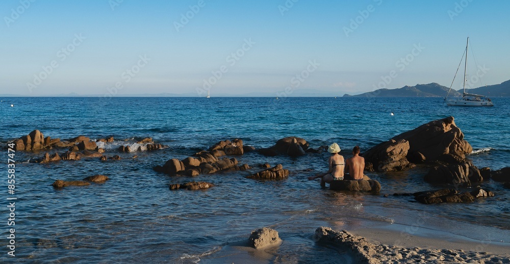 Serene Seascape with People on Shore