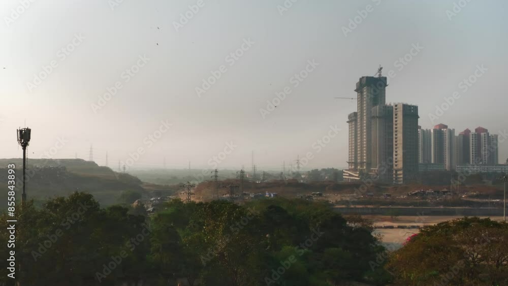 A wide shot of the smog-filled urban landscape with newly constructed buildings, skyscrapers or residential complexes to cater ever expanding city needs. Concept of Air pollution and development A wide shot of the smog-filled urban landscape with newly constructed buildings, skyscrapers or residential complexes to cater ever expanding city needs. Concept of Air pollution and development