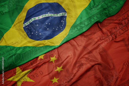 Canvas Print waving colorful flag of brazil and national flag of china on the dollar money background