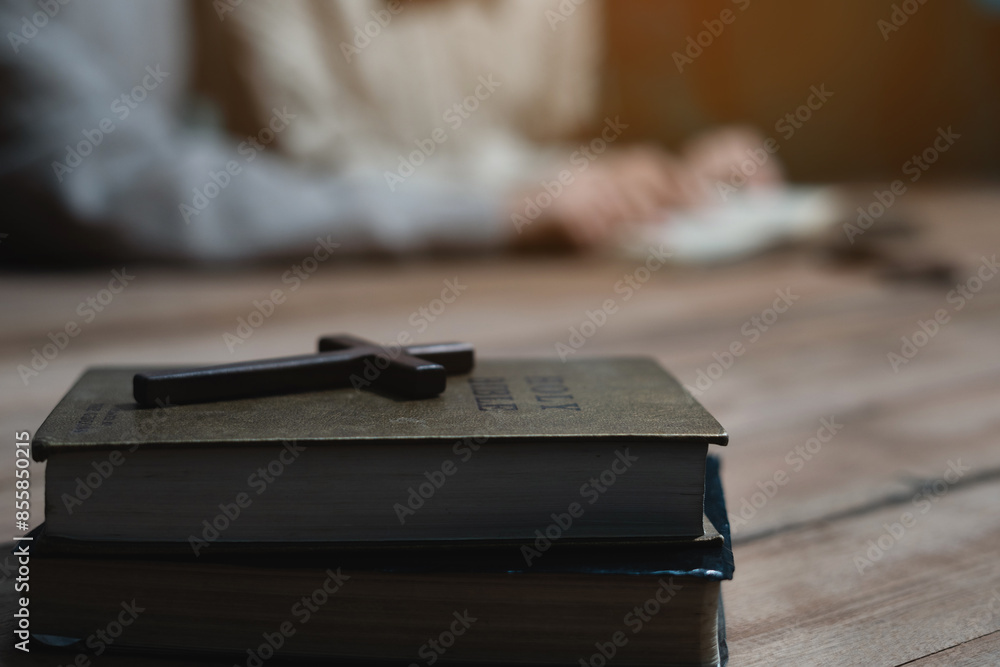 Asian men and women hands praying to god with the bible. Pray for god blessing. Religious beliefs Christian life crisis prayer to god. Asian men and women hands praying to god with the bible. Pray for god blessing. Religious beliefs Christian life crisis prayer to god.