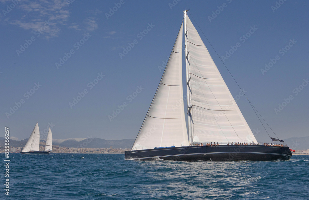 Sailing yacht at Mediterranean Sea. Sail. Boat. Palma de Mallorca. Super sailing yacht. Full sail. Sailing yacht at Mediterranean Sea. Sail. Boat. Palma de Mallorca. Super sailing yacht. Full sail.