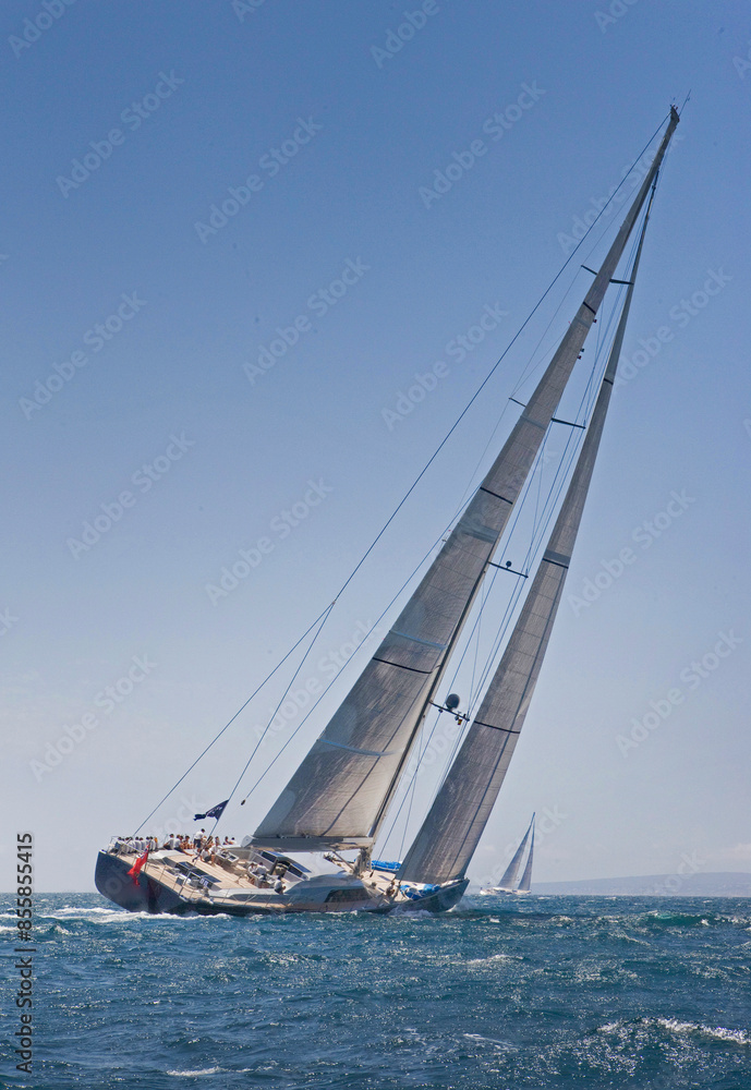 Sailing yacht at Mediterranean Sea. Sail. Boat. Palma de Mallorca. Super sailing yacht. Full sail. Sailing yacht at Mediterranean Sea. Sail. Boat. Palma de Mallorca. Super sailing yacht. Full sail.