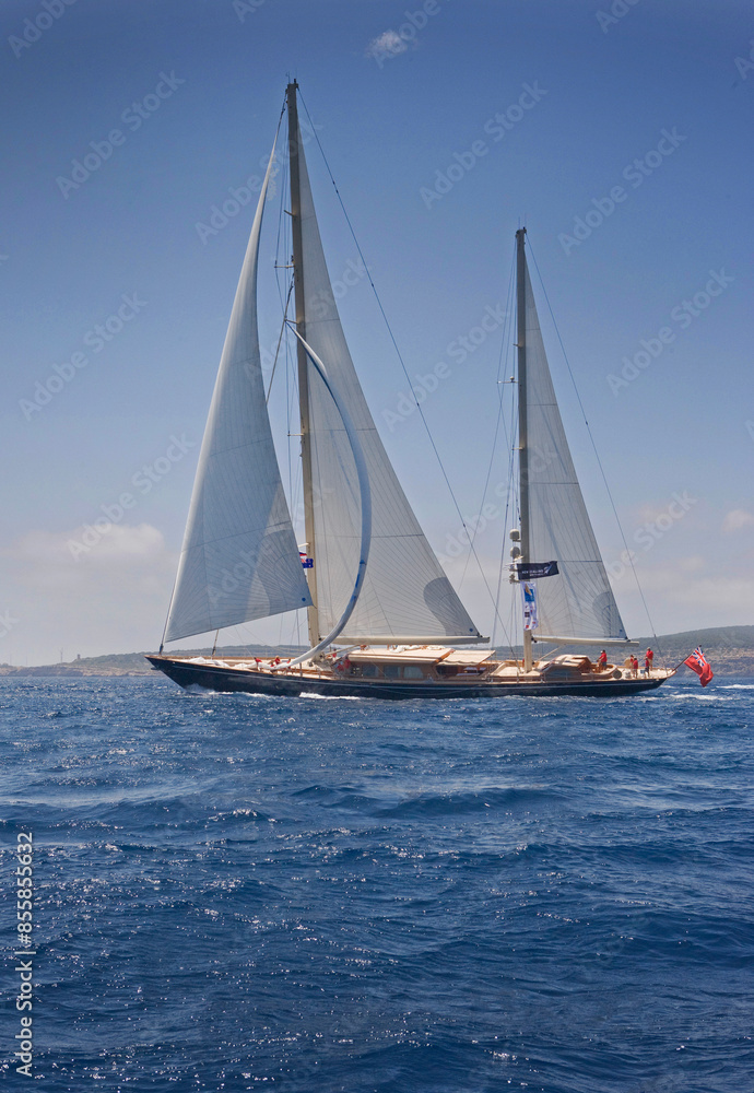 Sailing yacht at Mediterranean Sea. Sail. Boat. Palma de Mallorca. Super sailing yacht. Full sail. Sailing yacht at Mediterranean Sea. Sail. Boat. Palma de Mallorca. Super sailing yacht. Full sail.