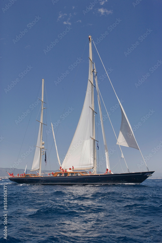 Sailing yacht at Mediterranean Sea. Sail. Boat. Palma de Mallorca. Super sailing yacht. Full sail. Sailing yacht at Mediterranean Sea. Sail. Boat. Palma de Mallorca. Super sailing yacht. Full sail.