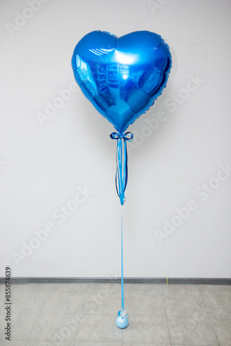 blue heart large foil balloon on white background