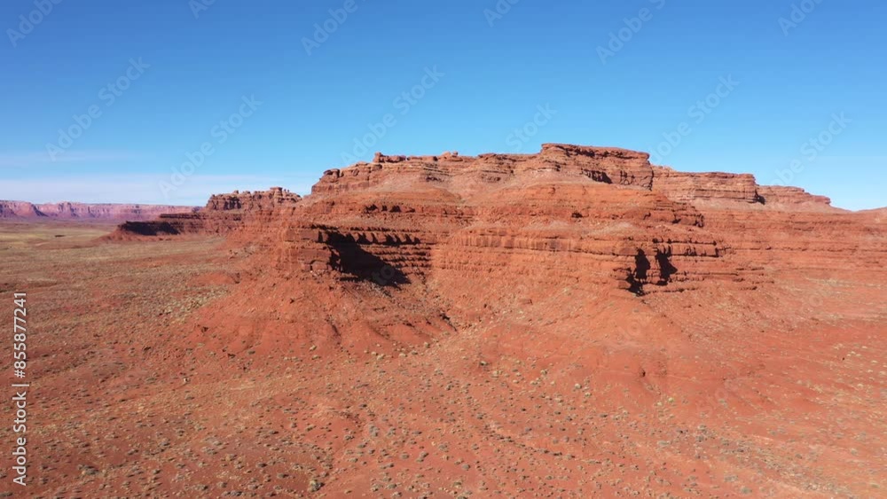 Red rocks layers brick canyon formation crumbling from erosion and weathered. Cliffs grand canyon of sandstone in heat desert western usa. Aerial view drone flying. Travel to national parks Red rocks layers brick canyon formation crumbling from erosion and weathered. Cliffs grand canyon of sandstone in heat desert western usa. Aerial view drone flying. Travel to national parks