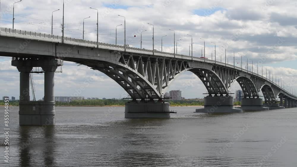 The bridge across the Volga on a cloudy May day. Saratov, Russia The bridge across the Volga on a cloudy May day. Saratov, Russia