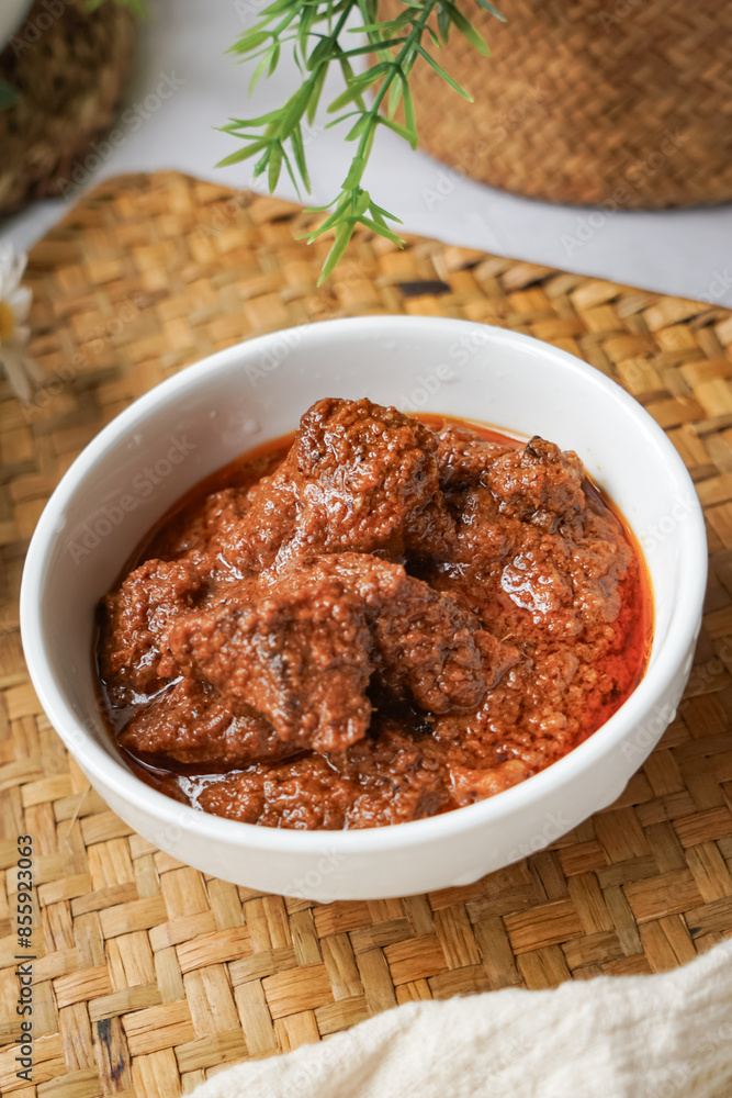 Rendang Daging, a Malaysian traditional dish featuring tender meat cooked in coconut milk and a blend of aromatic spices. Rendang Daging, a Malaysian traditional dish featuring tender meat cooked in coconut milk and a blend of aromatic spices.