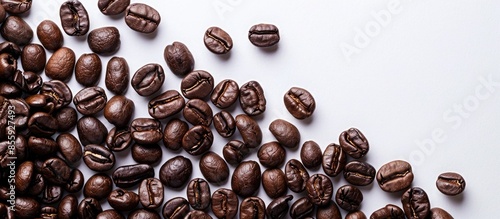 Coffee beans. Coffee beans are spread out on the surface. Copy space image. Place for adding text and design
