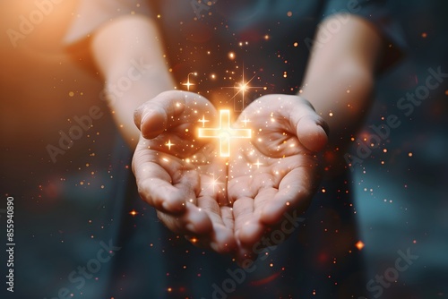 Person holding illuminated cross photo