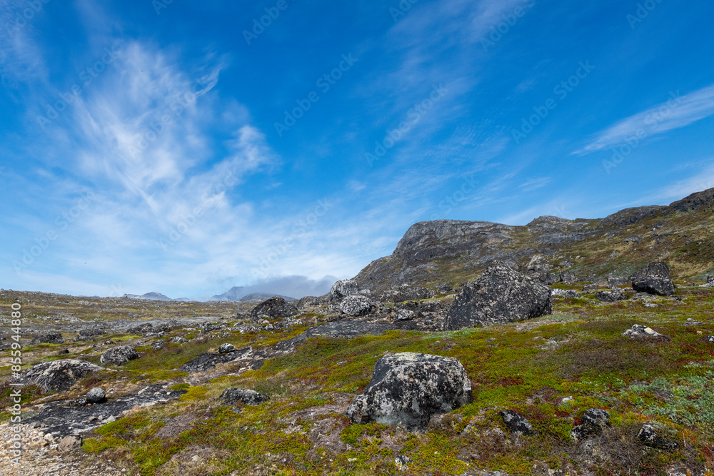 Greenland Nanortalik lava stones volcanic mountain fjord arctic landscape on a sunny day Greenland Nanortalik lava stones volcanic mountain fjord arctic landscape on a sunny day