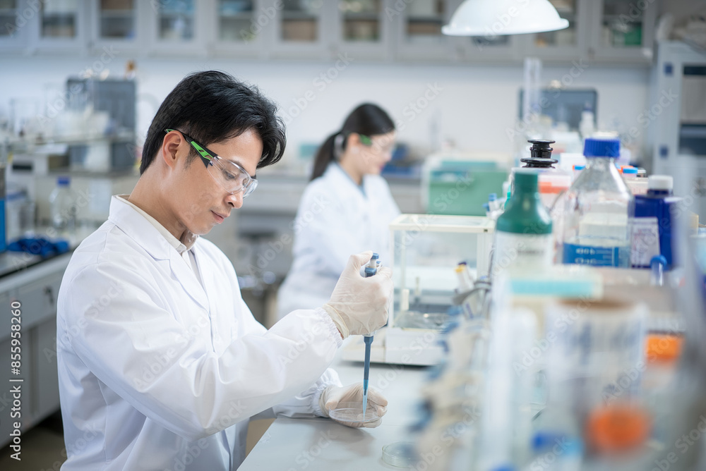 doctor doing experiment in lab doctor doing experiment in lab