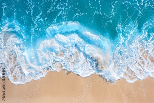 Background concept of blue ocean with soft waves and fine sand beach in summer © Maxim Borbut