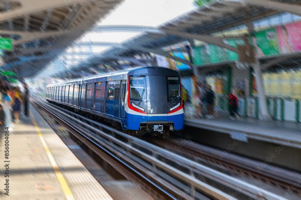 Fototapeta premium BKK BTS Bangkok Mass Transit System Sky train which is an elevated tram over the busy streets oh BKK Thailand 