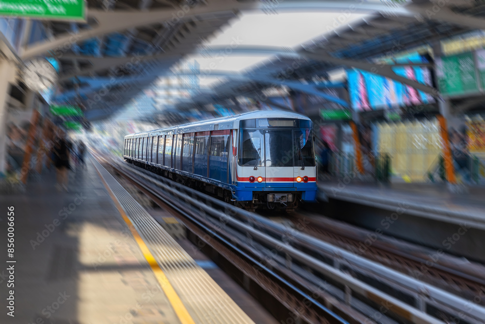 Fototapeta premium BKK BTS Bangkok Mass Transit System Sky train which is an elevated tram over the busy streets oh BKK Thailand 