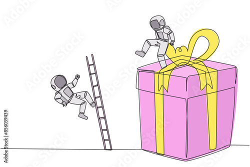 Single continuous line drawing the astronaut kicks opponent who is climbing the gift box with the ladder. Competition justifies any means to get rewards. The rival. One line design vector illustration