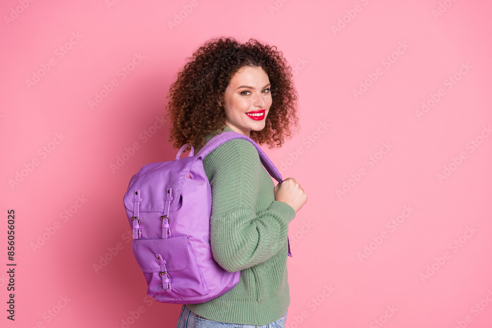 Photo of cheerful nice lovely cute woman wear stylish khaki clothes hold bag isolated on pink color background Photo of cheerful nice lovely cute woman wear stylish khaki clothes hold bag isolated on pink color background