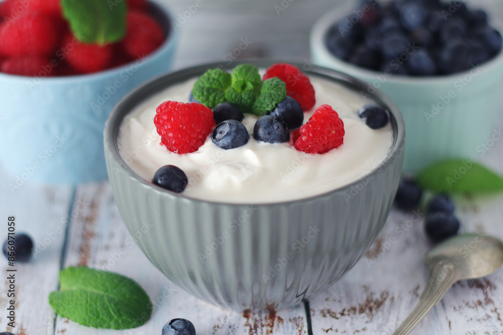 A bowl with Greek yogurt with berries A bowl with Greek yogurt with berries