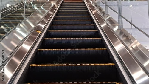 going up by escalator 