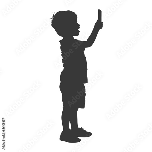 Silhouette of child engrossed in phone.