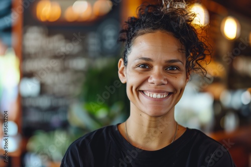 Smiling Woman In Cozy Cafe Background