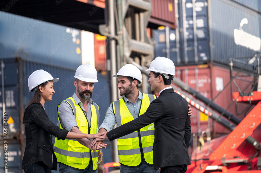 group of businessman, Logistics engineer and inspector and businessman cheer up and happy to about success business deal and project in shipping containerin commercial transport port group of businessman, Logistics engineer and inspector and businessman cheer up and happy to about success business deal and project in shipping containerin commercial transport port