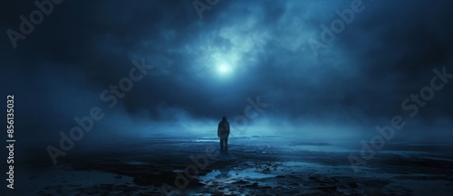 man standing in dark blue creepy and mystic landscape