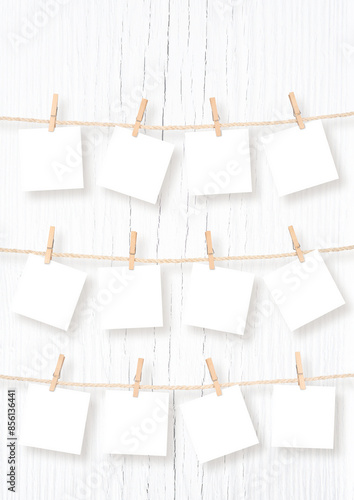 Fotografía Twelve Blank Square Frames for Baby Picture Hanging on Rope Isolated on White and PNG Transparent Background