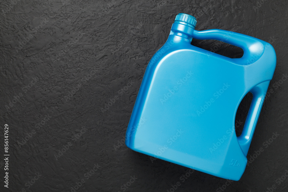 Machine oil on concrete background, top view Machine oil on concrete background, top view