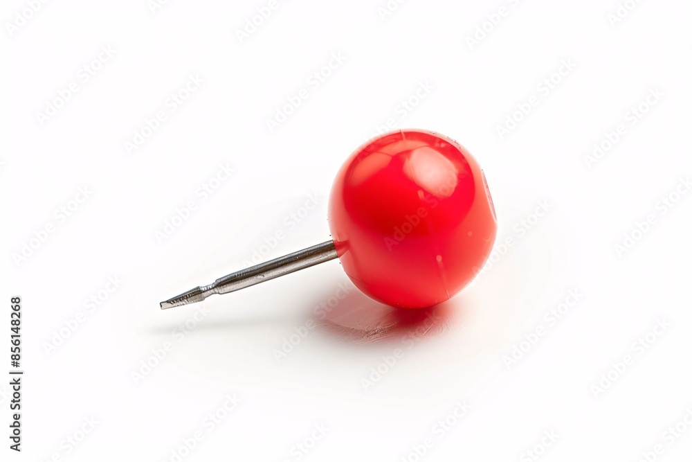 a red ball with a metal tip a red ball with a metal tip
