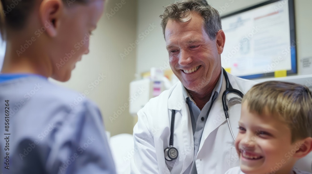 Hospital Healing: Photograph the healing environment of a hospital as a Caucasian doctor smiles compassionately while attending to a young patient, promoting a sense of safety and well-being. Hospital Healing: Photograph the healing environment of a hospital as a Caucasian doctor smiles compassionately while attending to a young patient, promoting a sense of safety and well-being.