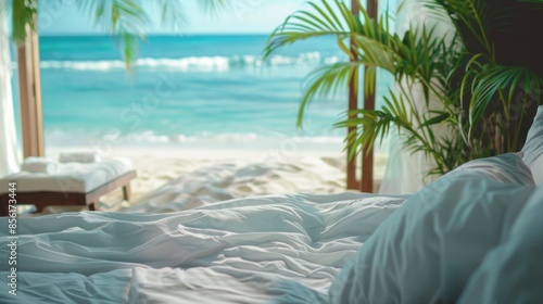 concept of relaxation on the ocean shore, white sand and palm leaves. © Игорь Розводовский