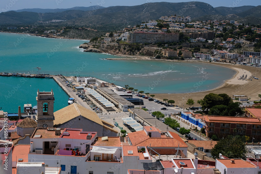 Obraz premium The view of the Peniscola port. Clean beach. Resort town. Castellon, Spain.