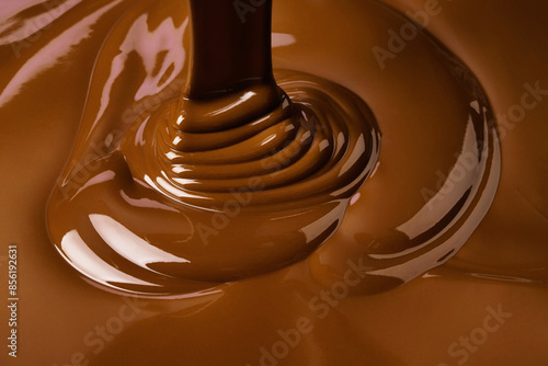 splash of melt chocolate. sweet cocoa dessert, dark chocolate background