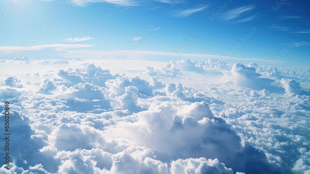 Naklejka premium View of the sky and clouds from an airplane window