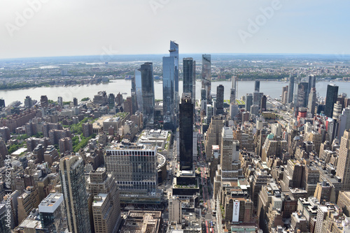 Photography Westward view from the Empire State Building featuring the towering skyscrapers
