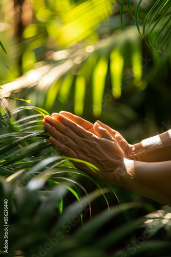 Therapeutic Outdoor Hand Massage in a Tropical Spa Amidst Lush Green Palm Trees and Natural Light