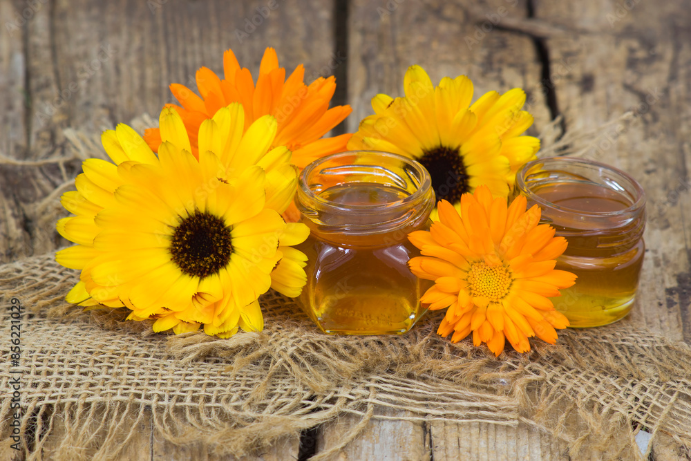 honey and calendula flowers honey and calendula flowers
